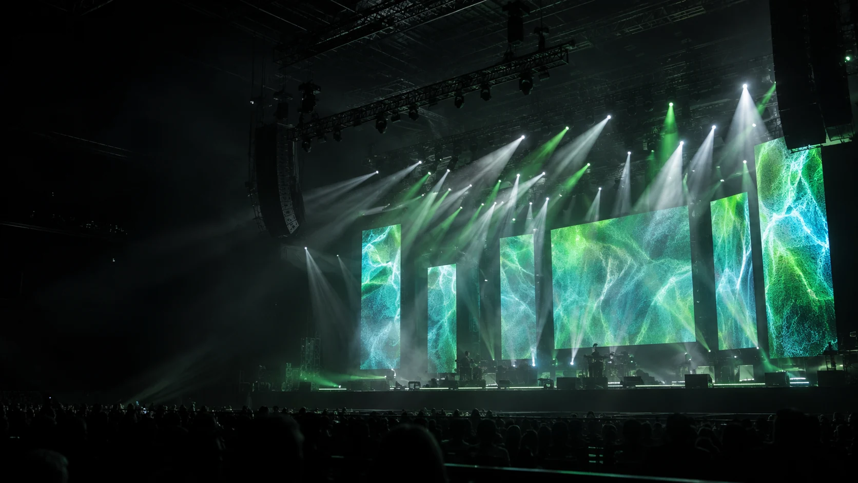 Concept visual of a large event stage with LED screens and beams of light.
